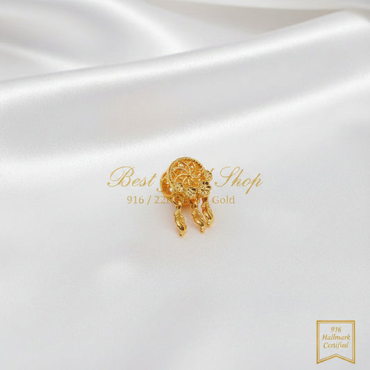916 gold ornate pendant charm with dangling details on white satin