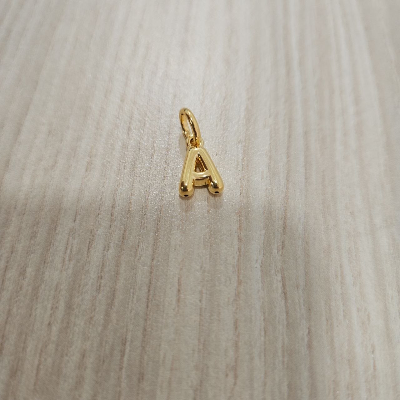 916 Gold Alphabert Pendant Feather Weight Smooth shiny Finish.