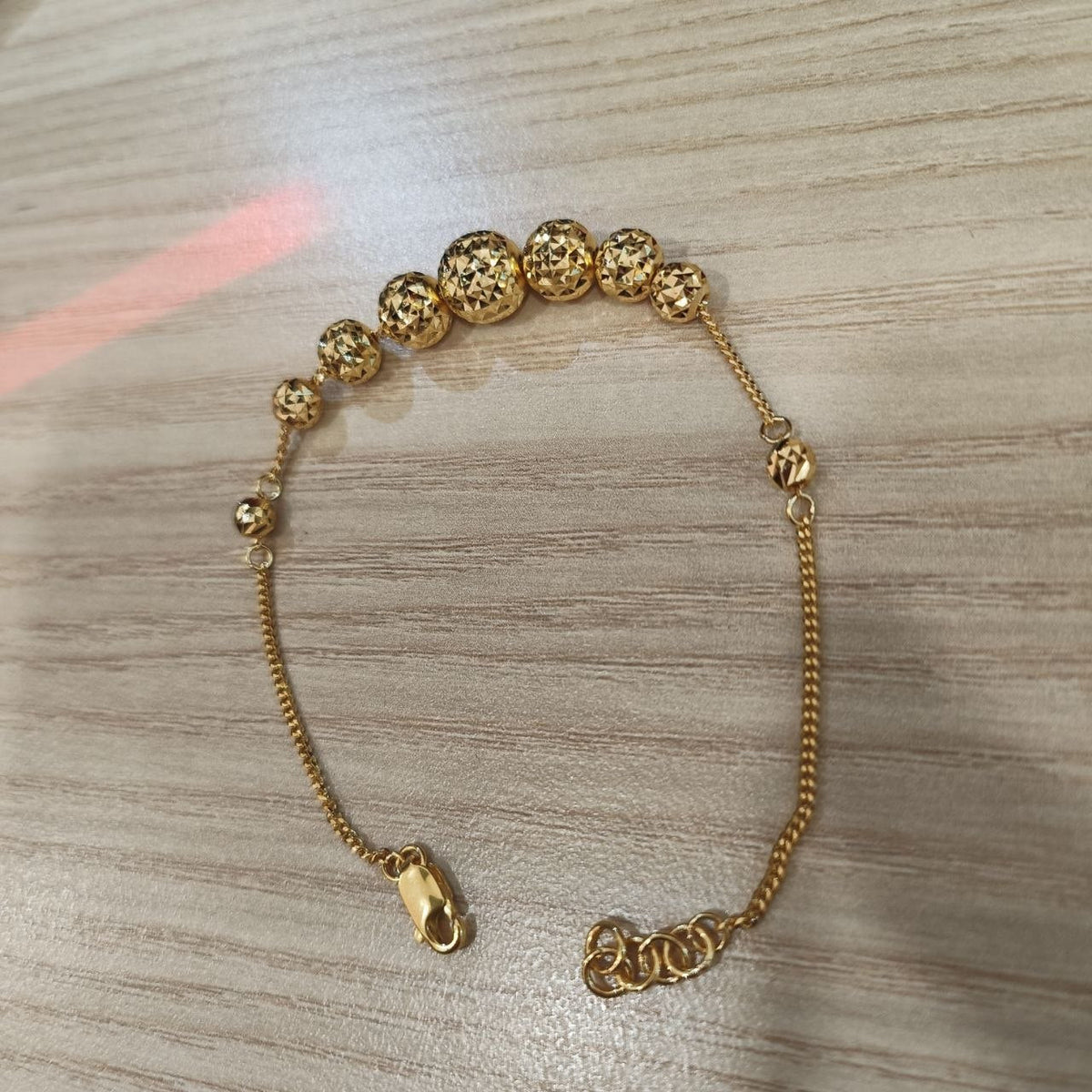 916 Gold Graduated Shiny Ball Bracelet | Elegant 22K Design