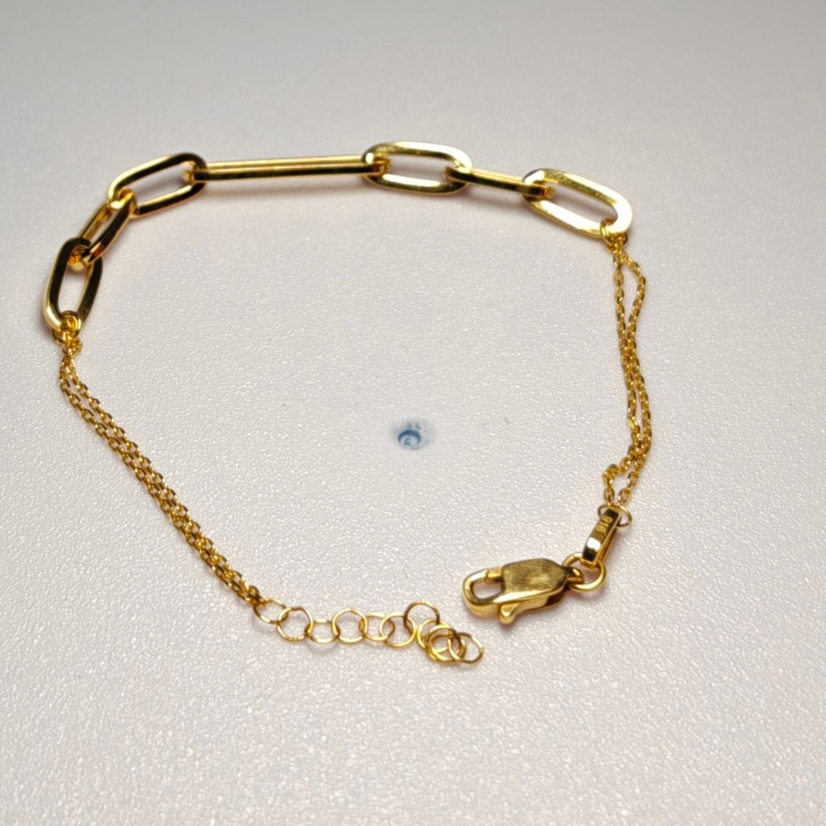 916 gold Wanzi link bracelet with elongated links and fine chain