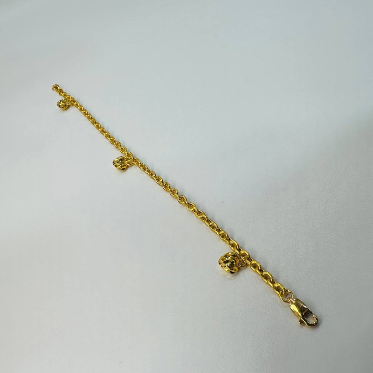 22k / 916 Gold Hollow Wan Zi Dangling Heart Bracelet - Best Gold Shop 22k gold 22k gold bracelet 916 gold Bracelets