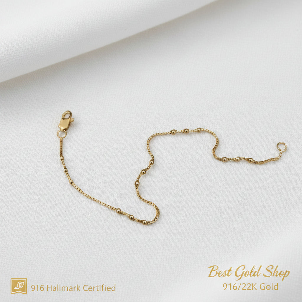 Close-up of fancy bead stations on a 22K Gold bracelet.