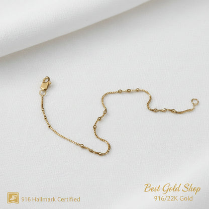 Close-up of fancy bead stations on a 22K Gold bracelet.