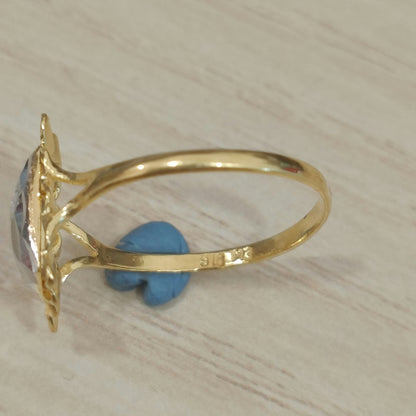 Close-up of the inner gold band and raised rectangular profile of a 916 gold two-tone Biscot V3 ring