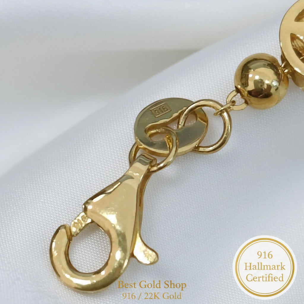 Side view of 916 Gold Chinese Coin charm bracelet.