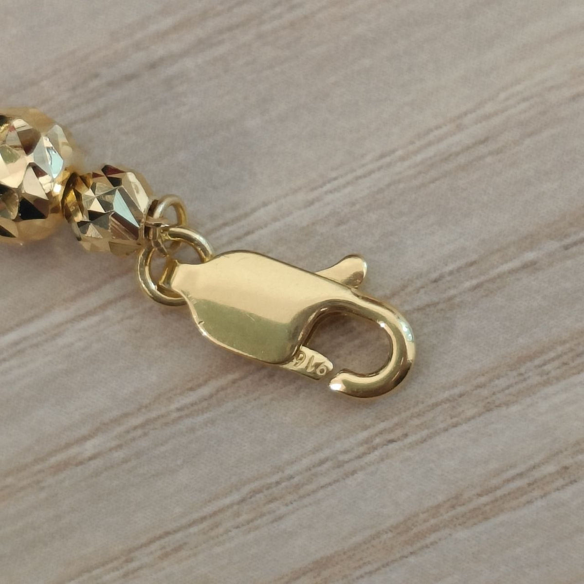 916 hallmark and lobster clasp on flower ball bracelet