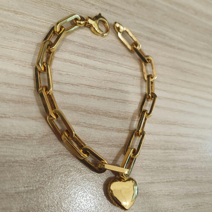 Full view of 916 gold fancy dangling heart bracelet