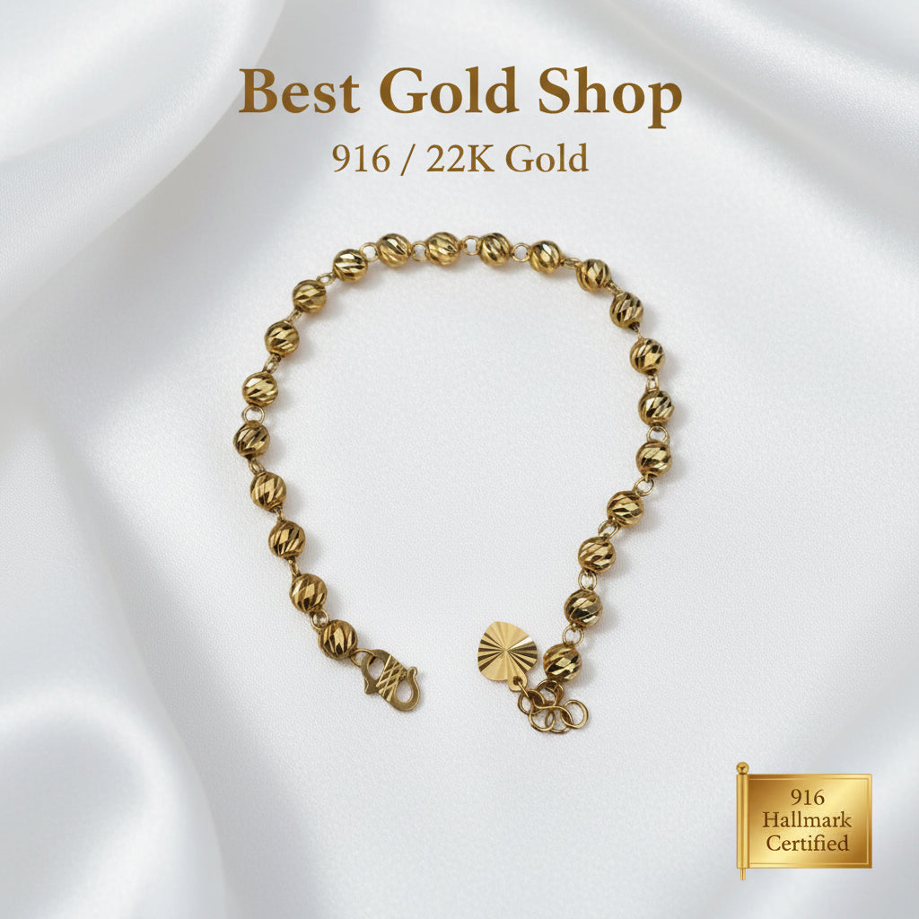 Close-up of clasp on 916 Gold Diamond-Cut Ball bracelet.