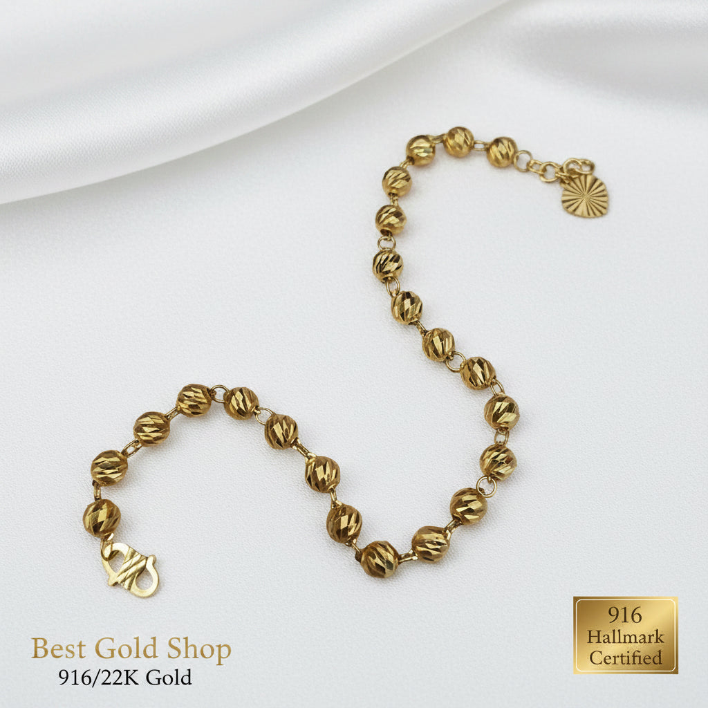 916 Gold Diamond-Cut Ball bracelet in full view.