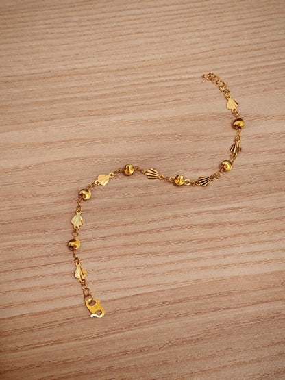 Adjustable 916 gold shell ball bracelet open view