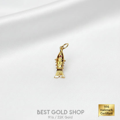 Angled view of a polished 916 gold fighting fish pendant