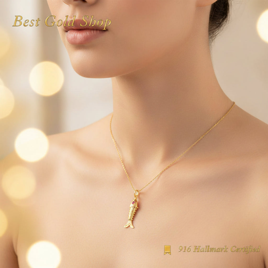 Front view of a detailed 916 gold fighting fish pendant