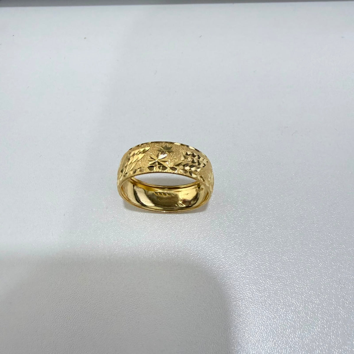 916 gold hollow sandy ring V1, front view of textured band