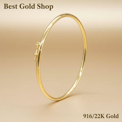 Side view of the slim 916 gold hollow shiny bangle