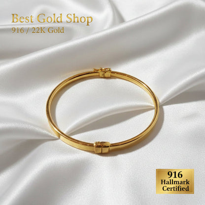 916 gold hollow shiny bangles arranged on white silk