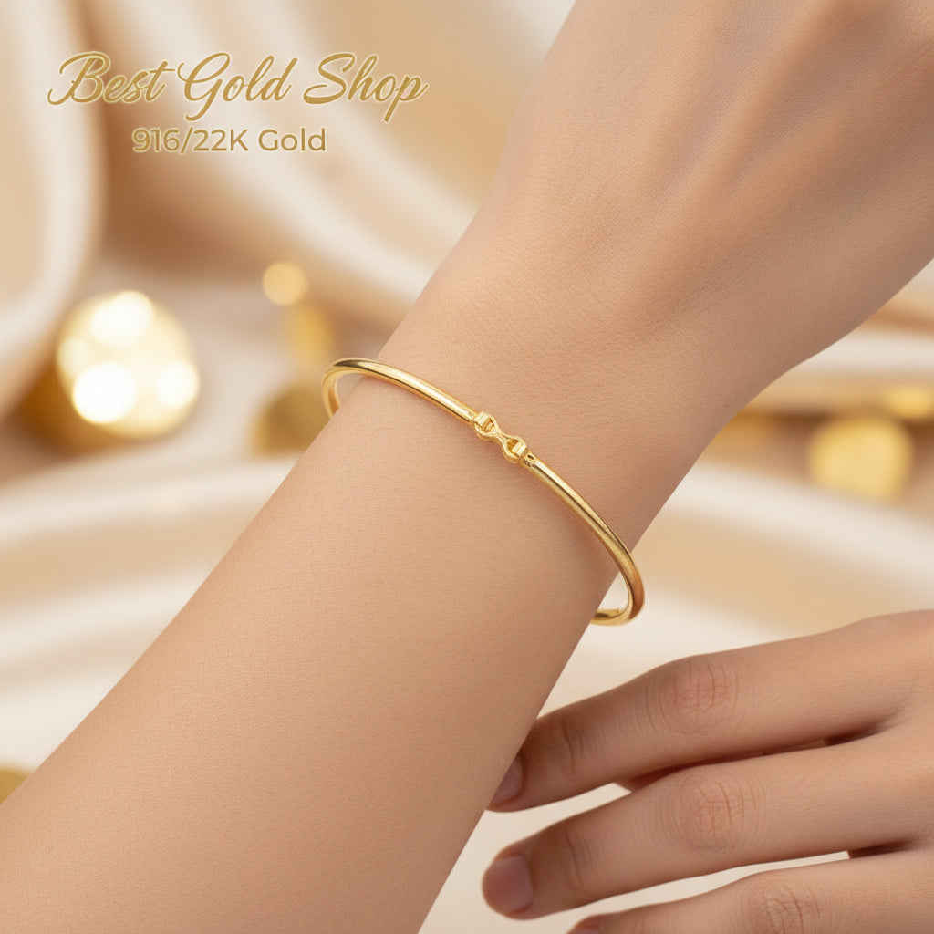 916 gold hollow shiny bangle worn on the wrist