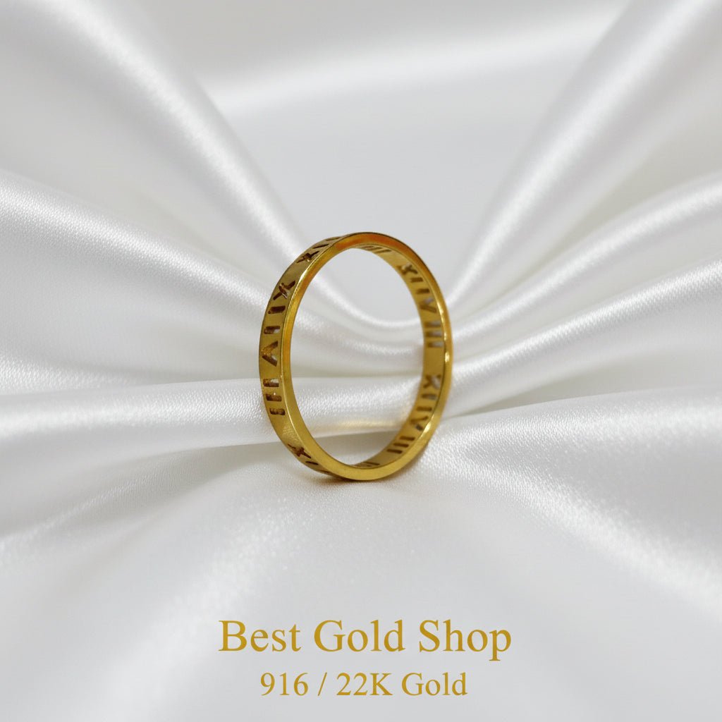 Slim 22K gold Roman numeral ring showing its narrow profile