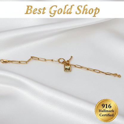 Adjustable 17.5–19cm 916 Gold Lock & Key Paperclip bracelet.