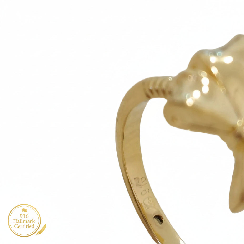 916 hallmark detail on gold ribbon bow ring