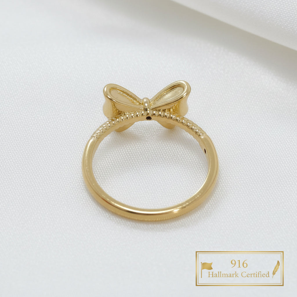 Rear view of 916 gold ribbon bow ring