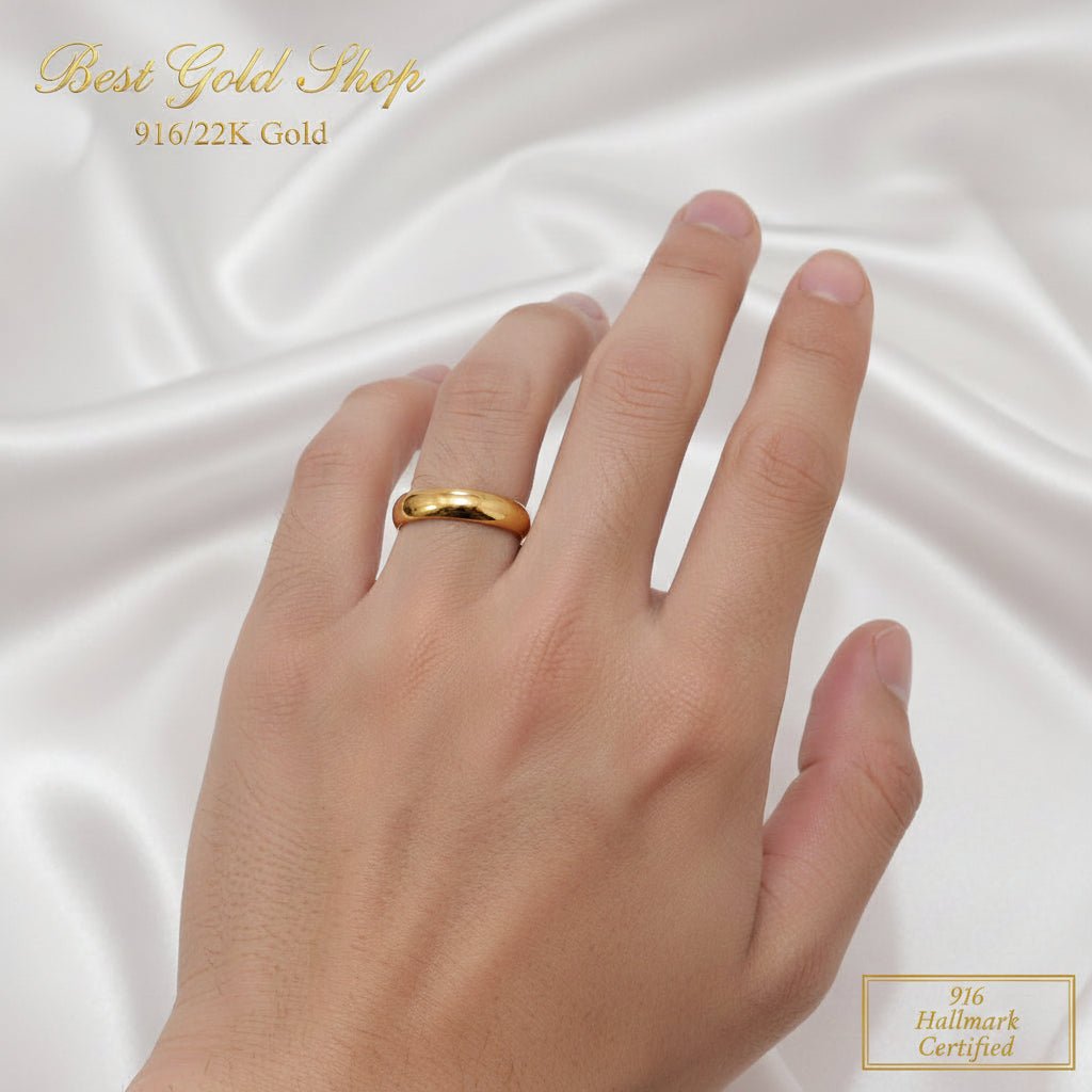 916 gold smooth band ring angled view