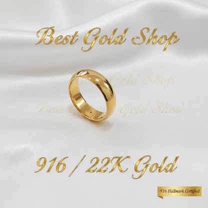 Side view of 916 gold smooth band ring
