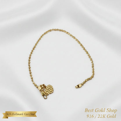 Full view of 916 Gold Solid Bead Bracelet with Heart Charm.