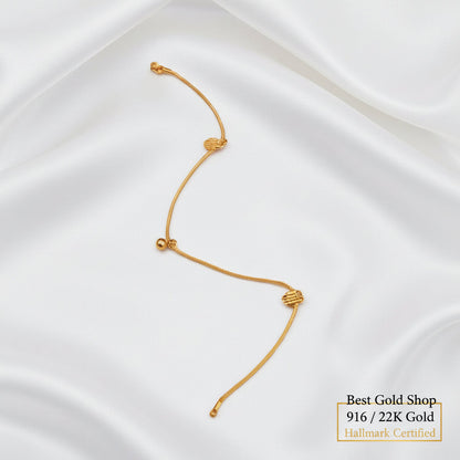 916 gold anklet with striped heart charms and a bell