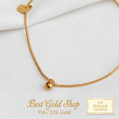 916 gold anklet with striped heart charms and a bell