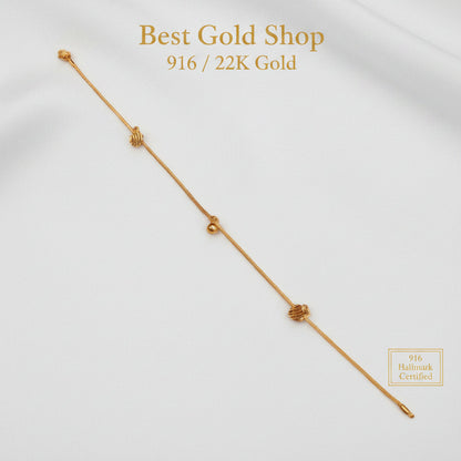 916 gold anklet with striped heart charms and a bell