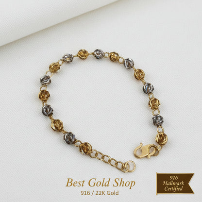Close-up of clasp on 916 Gold Two-Tone Faceted Ball bracelet.