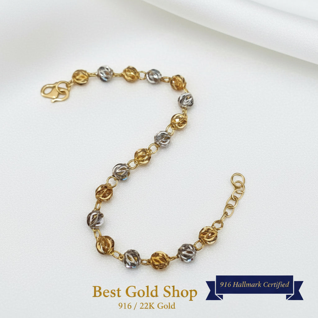 916 Gold Two-Tone Faceted Ball bracelet in full view.