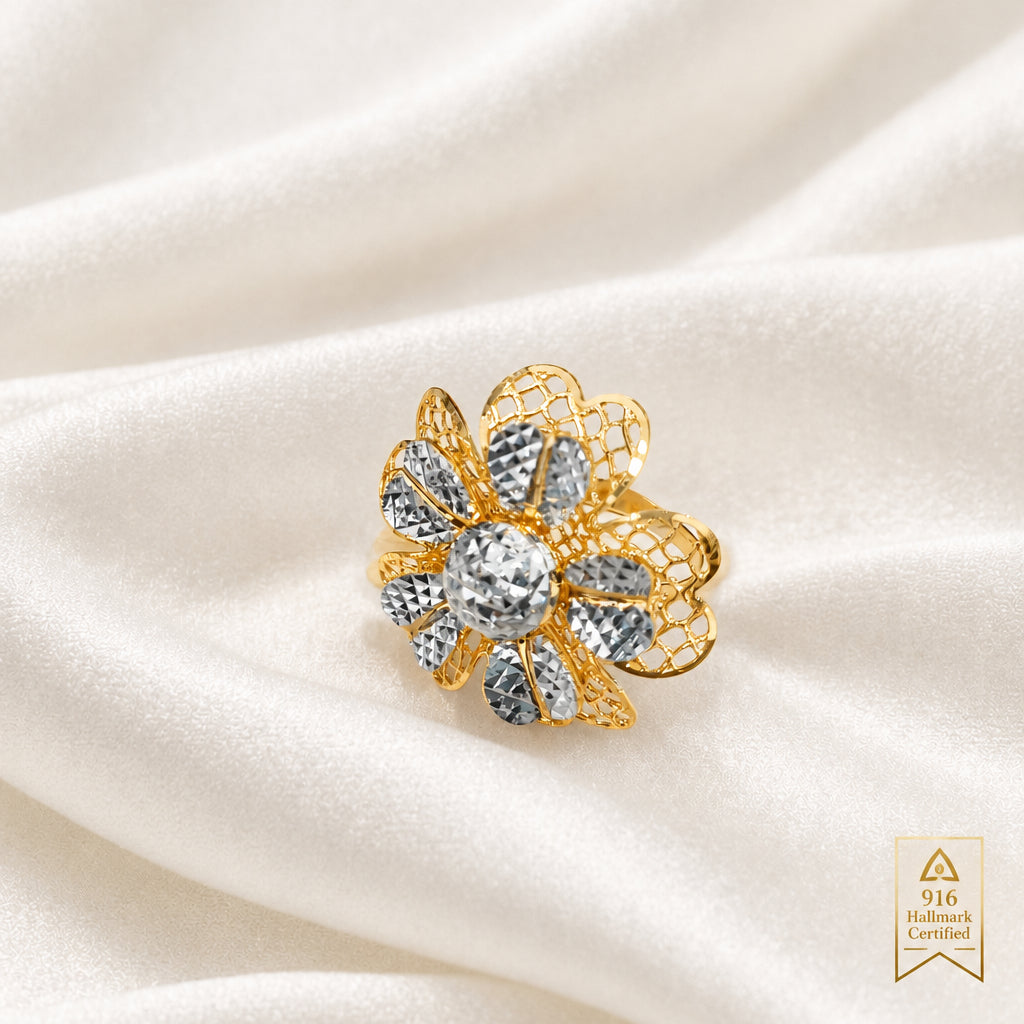 916 gold two-tone floral ring with layered openwork petals on cream satin