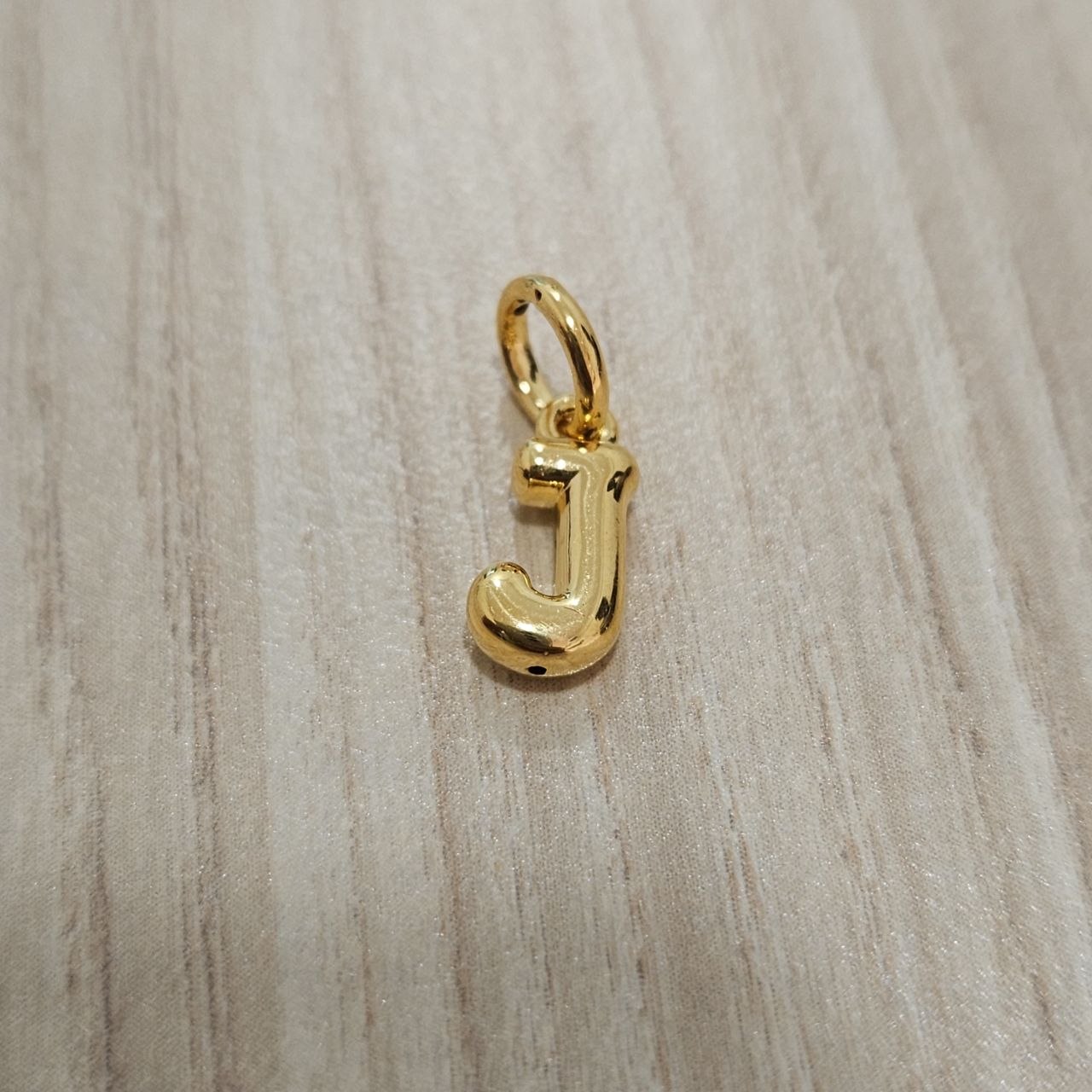 916 Gold Alphabert Pendant Feather Weight Smooth shiny Finish.