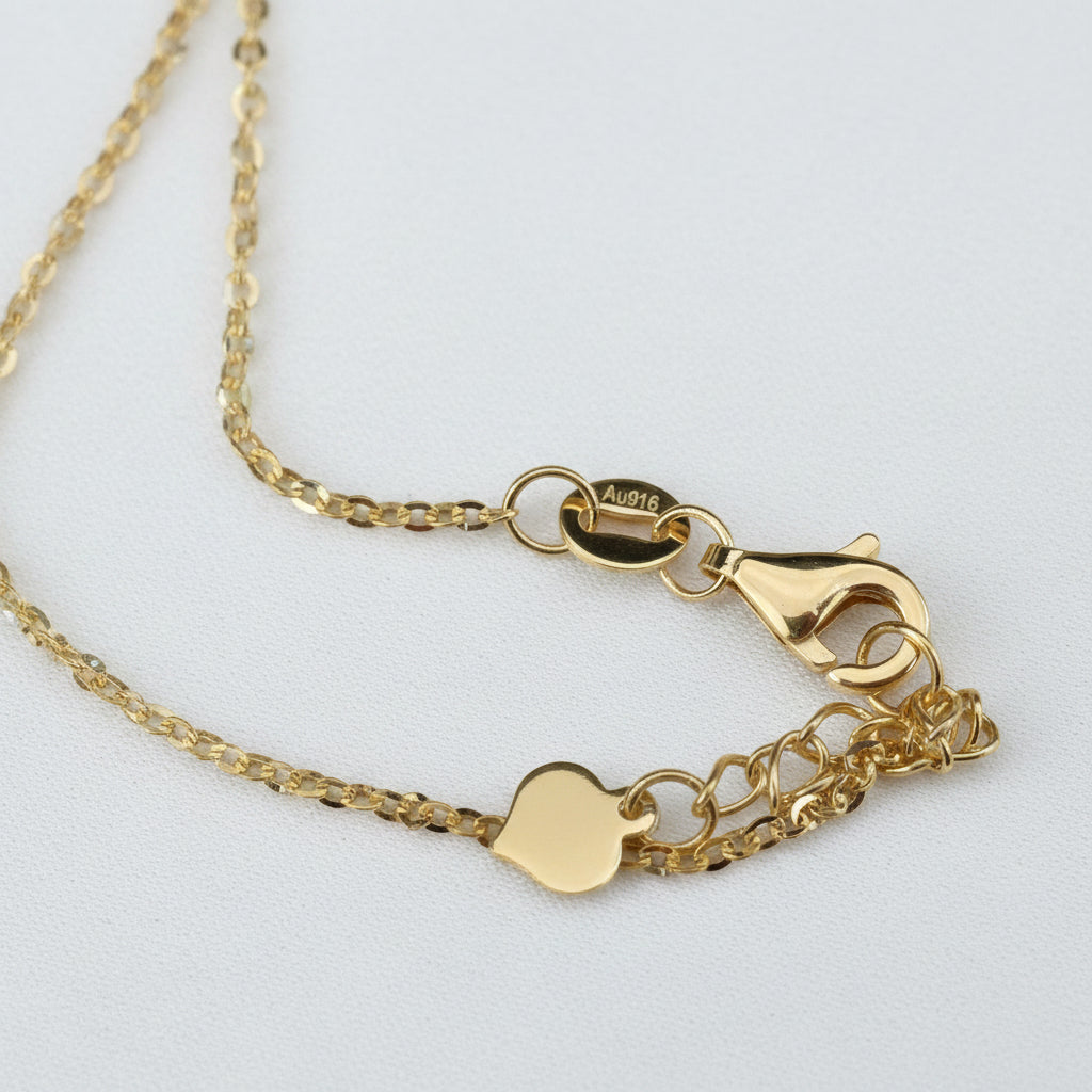 916 gold fancy motif chain shown from the clasp end
