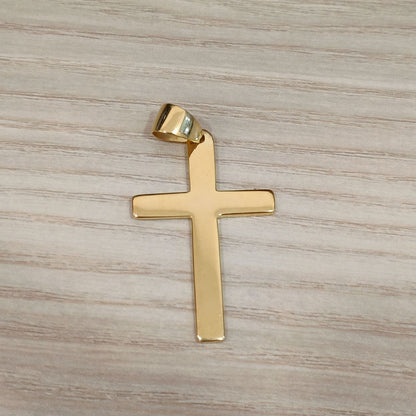 22K gold cross pendant shown upright with its smooth surface and bail