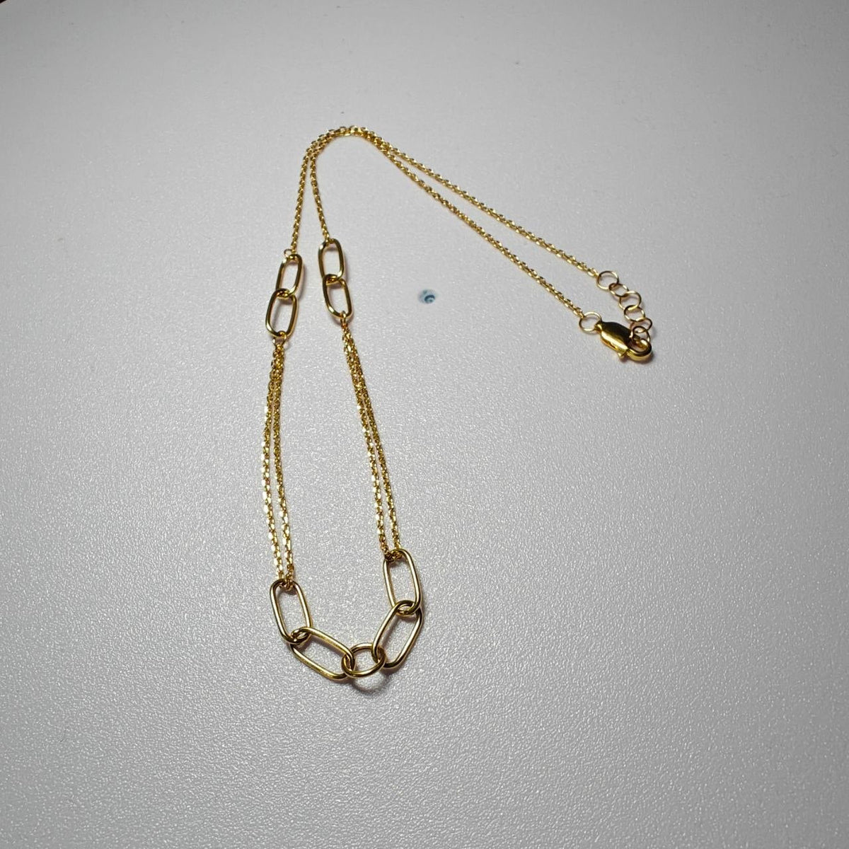 916 gold WanZi loop necklace with adjustable chain and oval links