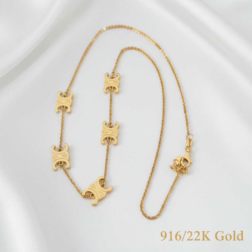 Decorative link detail on adjustable 22K gold fancy motif chain