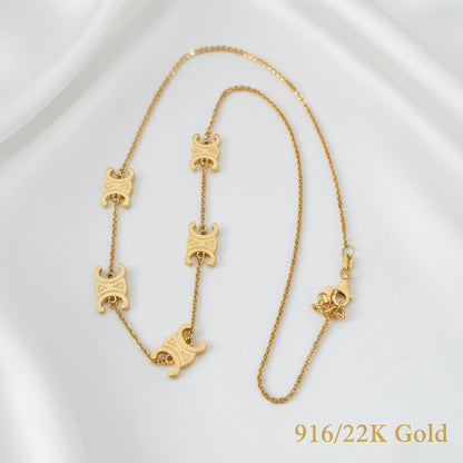 Decorative link detail on adjustable 22K gold fancy motif chain