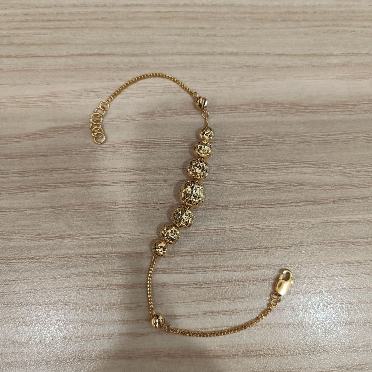 916 Gold Graduated Shiny Ball Bracelet | Elegant 22K Design