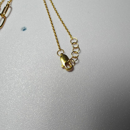 Close-up of adjustable clasp on 916 gold WanZi loop necklace