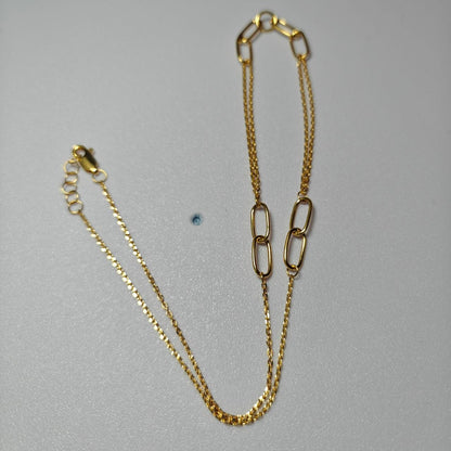 Detail of oval loop and fine chain sections on 916 gold necklace