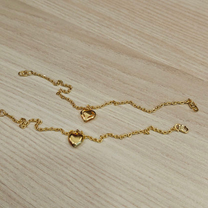 916 Gold Wan Zi Dangling Heart Bracelet Slim elegant design