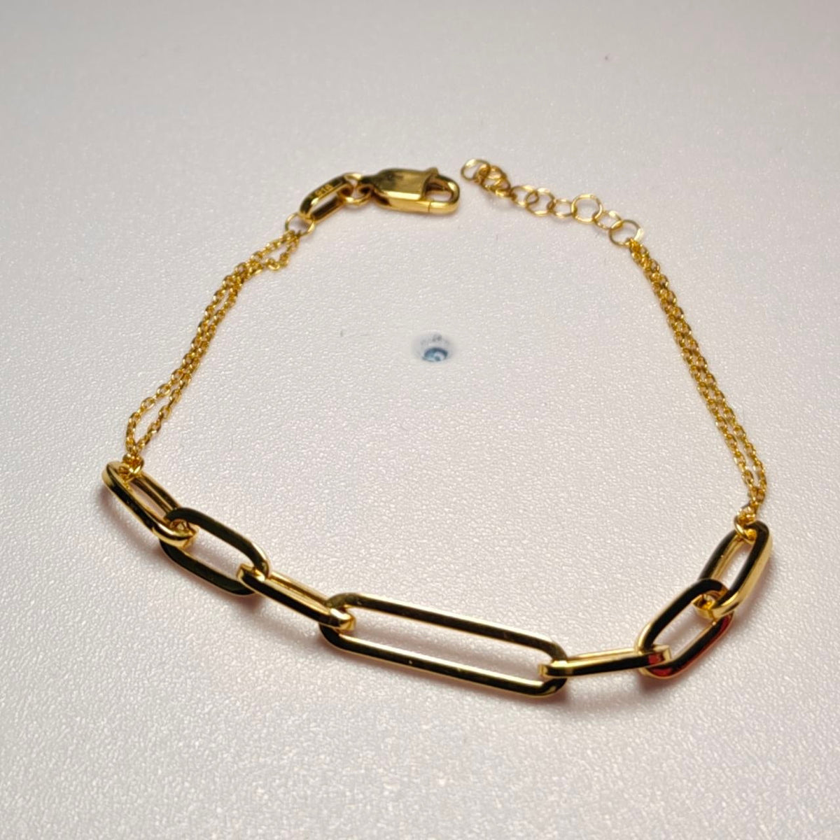 916 gold Wanzi link bracelet with elongated links and fine chain