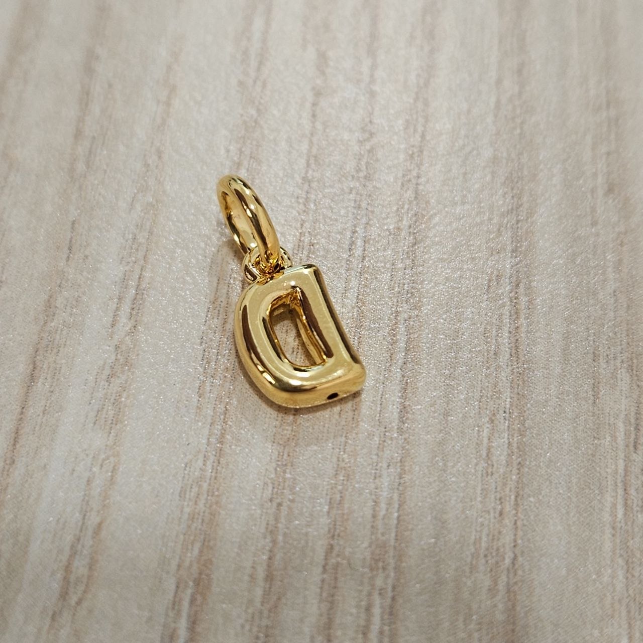 916 Gold Alphabert Pendant Feather Weight Smooth shiny Finish.