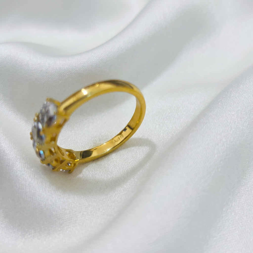 Angled close-up of 916 gold eternity-style ring showing the inner band and Au916 stamp