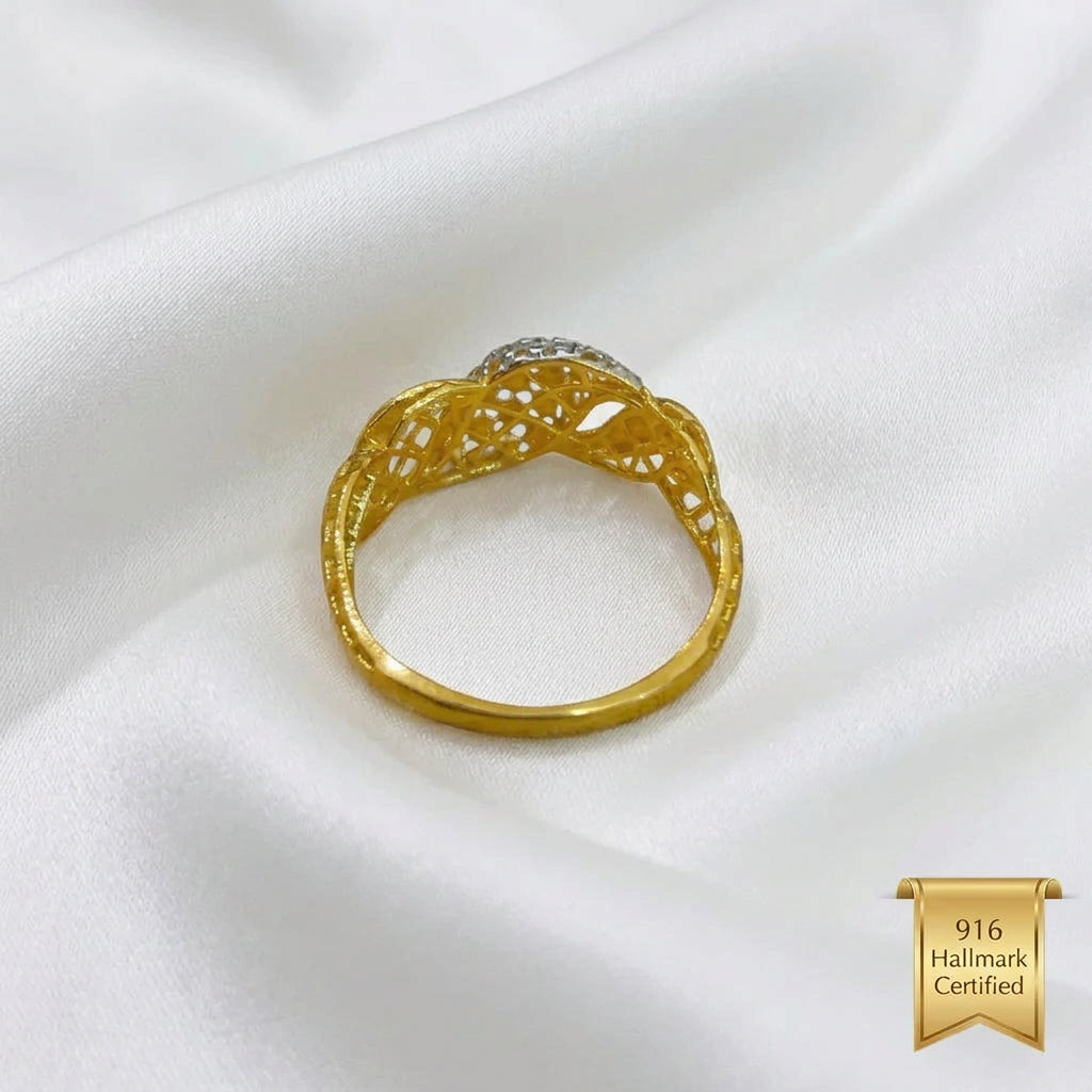Underside of 916 gold two-tone twist ring showing the openwork shoulders and plain back of the band