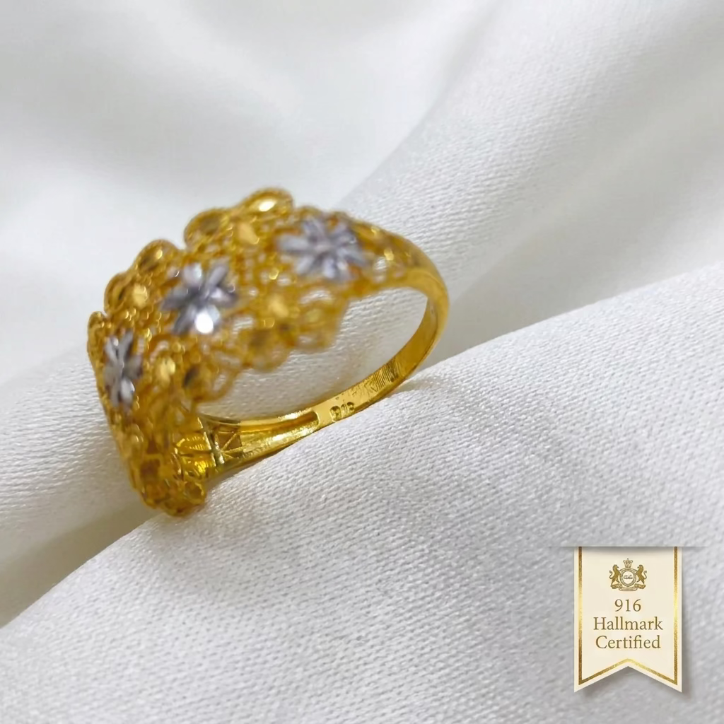 Close-up side view of the 916 gold Serenity Petal ring showing silver-colour flowers, openwork details and inner band